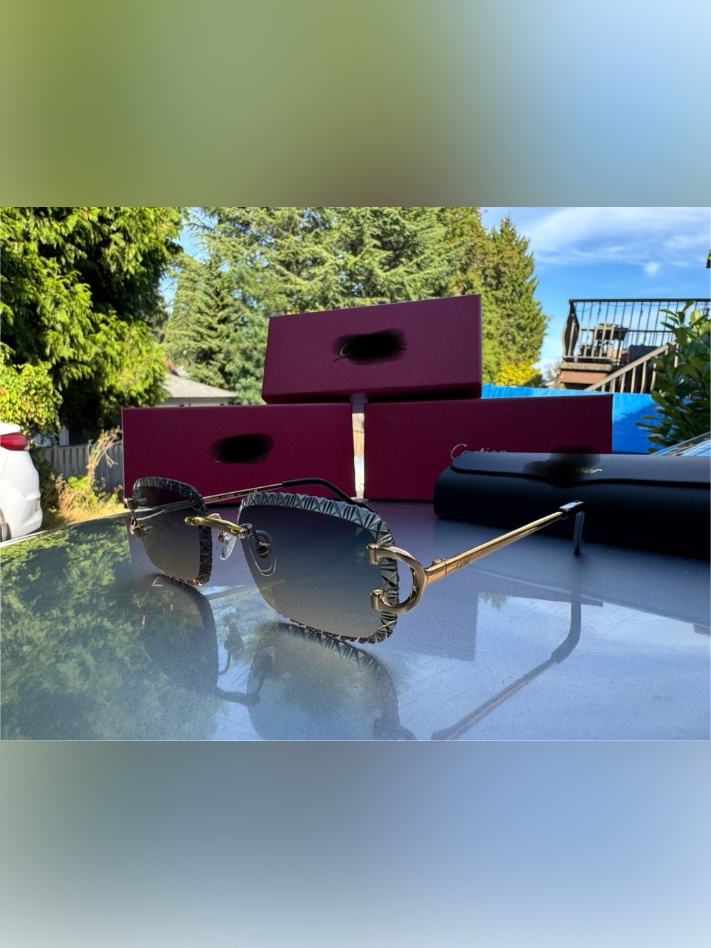 Cartier Women's Rimless Sunglasses with Gold Temples and Gradient Smoke Lenses